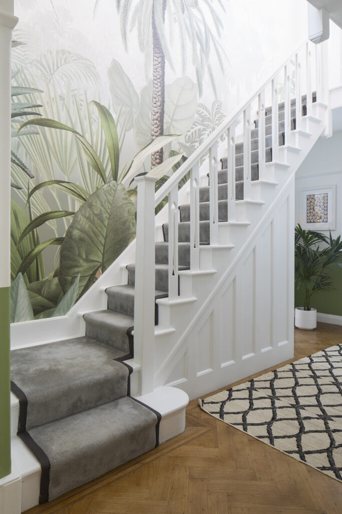 Residential Interior Design project in Hove, Sussex featuring hallway of family home with staircase and feature wallpaper